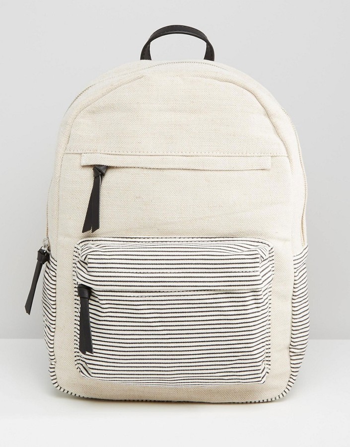 beige canvas backpack