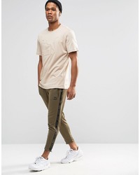 Puma Oversized T Shirt In Beige To Asos