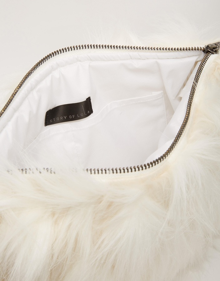 white fur clutch bag