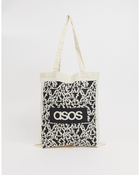 ASOS DESIGN Tote Bag In Beige With Noise Print And Brands List