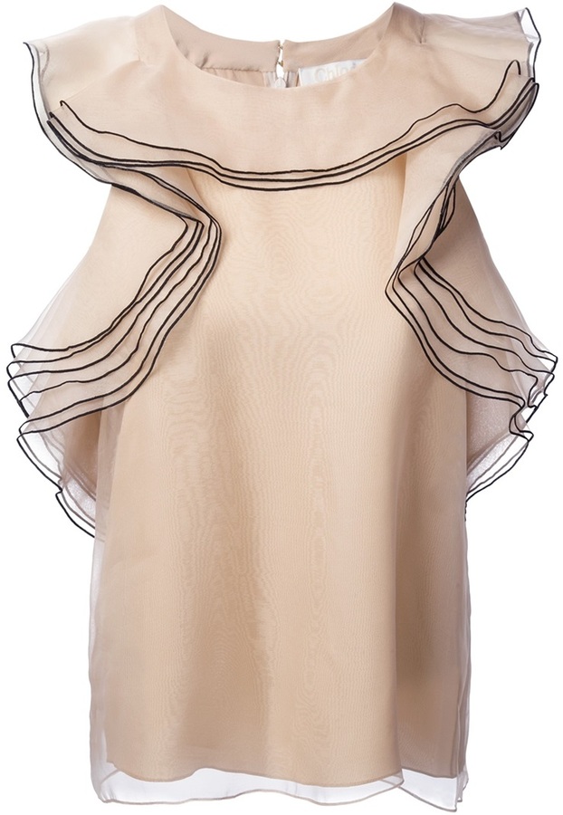 beige sleeveless blouse