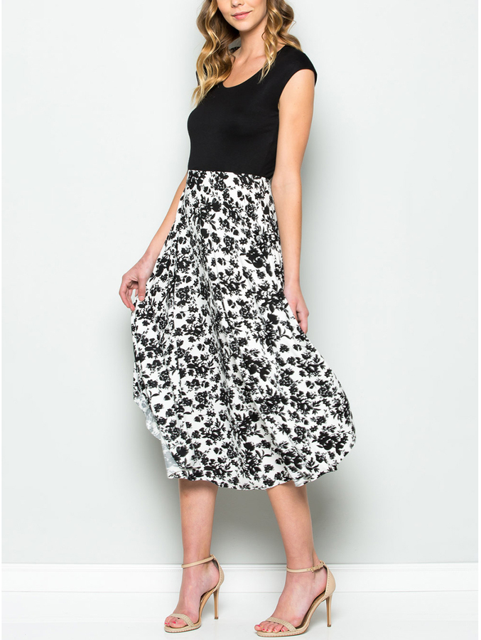 black and white midi dress with sleeves