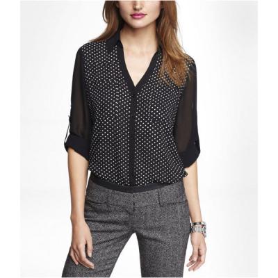 white shirt with small black polka dots