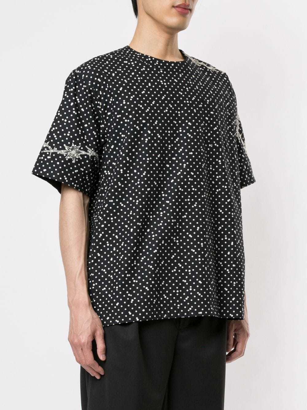 Sacai Dotted T Shirt, $426 | farfetch.com | Lookastic