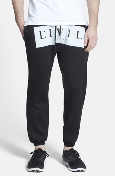 https://cdn.lookastic.com/black-and-white-print-sweatpants/civil-regime-box-logo-jogger-sweatpants-56217-original.jpg
