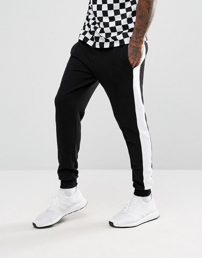 black joggers with white stripe