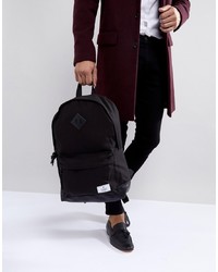 ASOS DESIGN Backpack In Black Canvas With Faux Leather Base