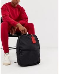 ASOS DESIGN Backpack In Black With Red Luggage Tag