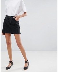 Asos Denim Mini Skirt With Raw Hem In Washed Black
