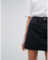 Asos Denim Mini Skirt With Raw Hem In Washed Black