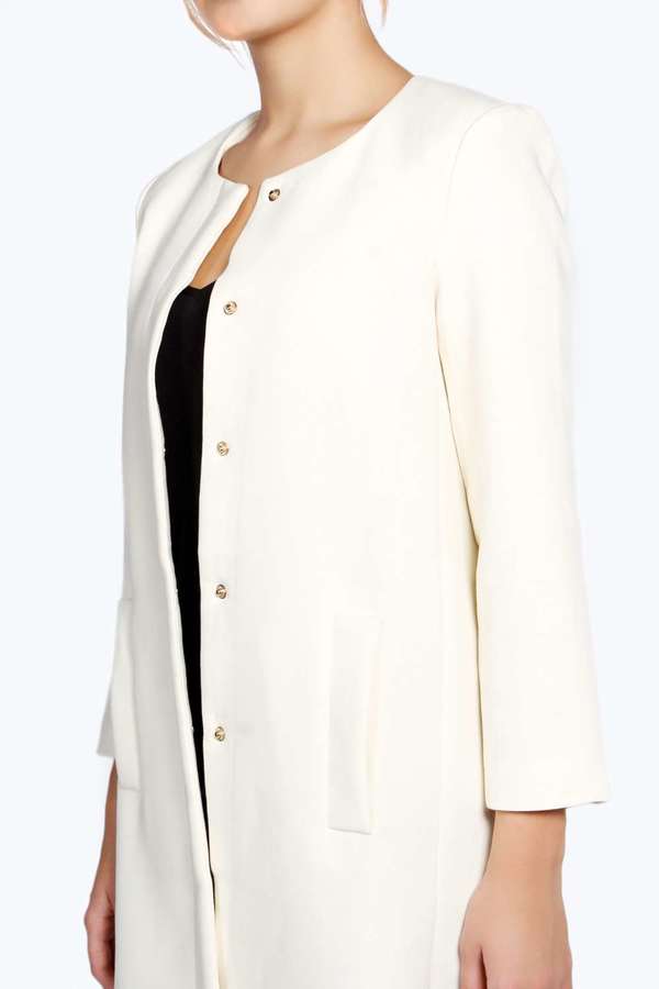 Boohoo Olivia Collarless Button Duster Coat, $90 | BooHoo | Lookastic