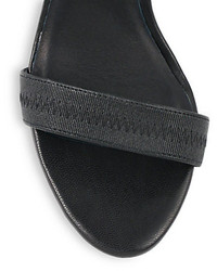https://cdn.lookastic.com/black-elastic-heeled-sandals/elaine-leather-elastic-crisscross-sandals-128357-medium.jpg