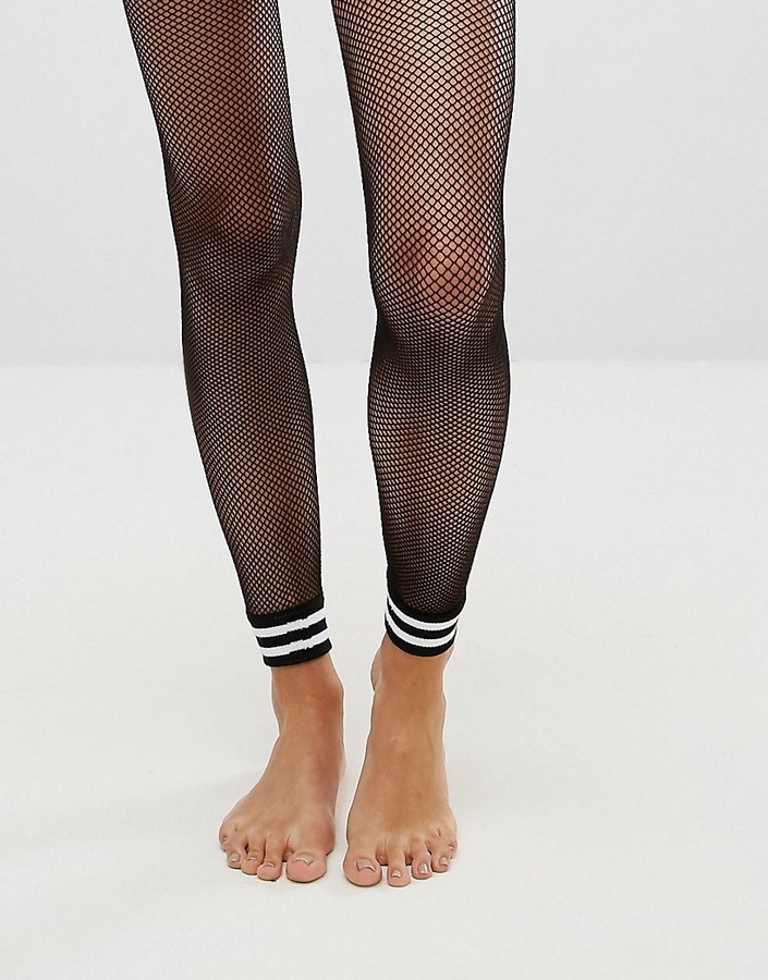 https://cdn.lookastic.com/black-horizontal-striped-fishnet-tights/stripe-cuff-footless-fishnet-tights-original-3764743.jpg
