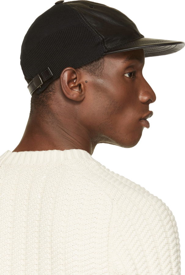 Maison Margiela Black Leather Ribbed Knit Cap, $350 | SSENSE