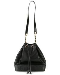 Chanel Vintage Embossed Logo Bucket Shoulder Bag, $4,659, farfetch.com