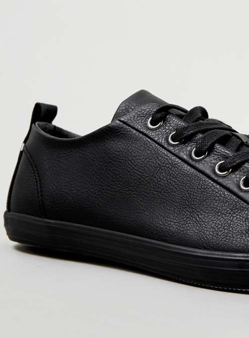 black leather plimsolls