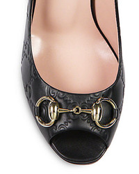 Gucci Gisele Monogram Embossed Leather Peep Toe Pumps