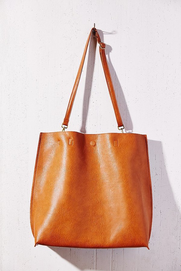 Urban Outfitters Oversized Reversible Vegan Leather Tote Bag, $79 ...