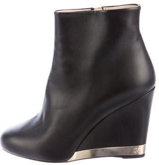Chanel Leather Wedge Ankle Boots, $530, TheRealReal