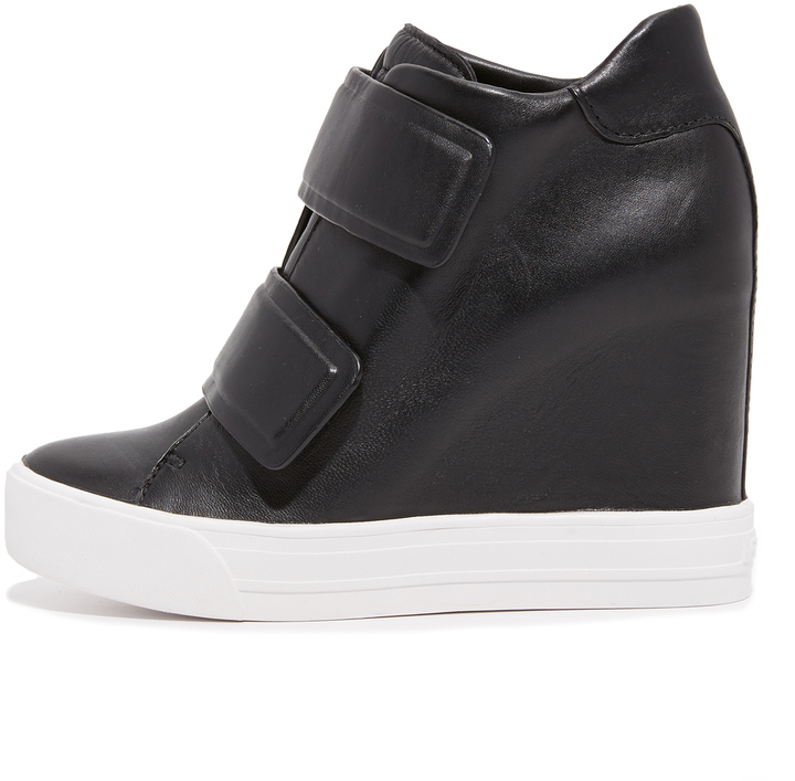 Buy DKNY Women's Comfortable Classic Slip-on Sneaker Heeled Sandal,  Bordeaux, 7.5 at Amazon.in