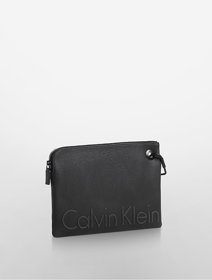 Calvin Klein Raised Logo Carabiner Pouch, $79