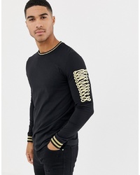 ASOS DESIGN Longline Long Sleeve T Shirt With Sartorial Sleeve Taping In Gold