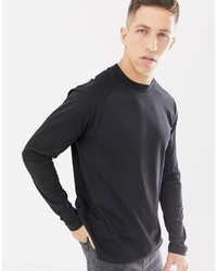 ASOS DESIGN Relaxed Long Sleeve Raglan T Shirt With High Neck In Black