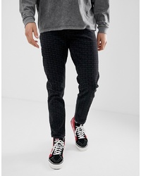 ASOS DESIGN Tapered Jeans With All Over Print In Black