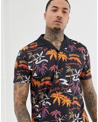 ASOS DESIGN Relaxed Polo With Hawaii Inspired Print
