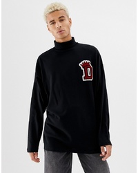 ASOS DESIGN Oversized Longline Long Sleeve T Shirt With Motif Applique And Roll Neck