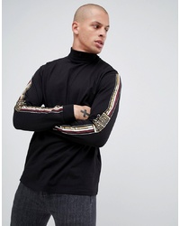 ASOS DESIGN Relaxed Long Sleeve T Shirt With Roman Numeral Sleeve Print And Roll Neck