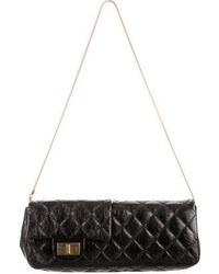 Chanel Reversible Reissue Clutch, $1,195, TheRealReal