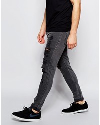 Asos Brand Super Skinny Jeans With Extreme Rips In Washed Black