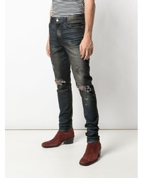 Amiri Ripped Faded Jeans