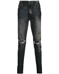 Amiri Ripped Faded Jeans