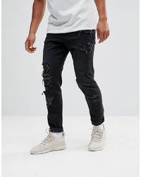 ASOS DESIGN Tapered Jeans In 125oz In Washed Black With Heavy Rips