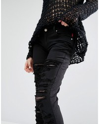 Tripp Nyc Extreme Rip Skinny Jeans With Fishnet, $81, Asos