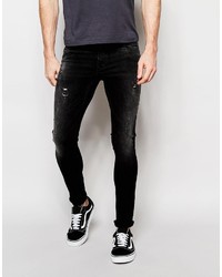Asos Brand Extreme Super Skinny Jeans With Knee Rips In Washed Black