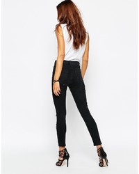 Asos Petite Ridley Skinny Ankle Grazer Jeans In Washed Black With Extreme Rips And Busts