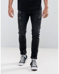 ASOS DESIGN Asos Skinny Jeans In 125oz Black With Rips