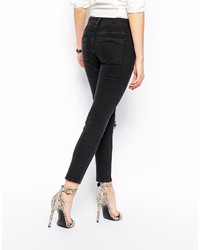 Asos Collection Whitby Low Rise Skinny Ankle Grazer Jeans In Washed Black With Ripped Knee