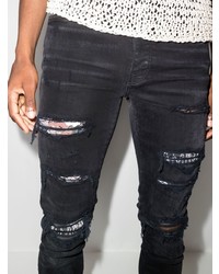 Amiri Hibiscus Art Patch Skinny Jeans