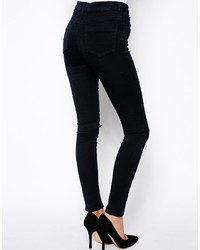 Asos Petite Ridley High Waist Ultra Skinny Jeans In Washed Black With Ripped Knee