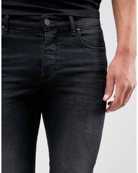 Asos Super Skinny 125oz Jeans With Knee Rips In Washed Black