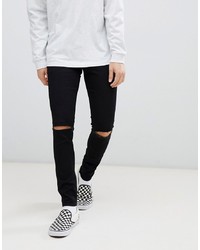 Cheap Monday Super Skinny Jeans In Black With Knee Rip