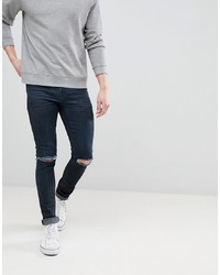 ASOS DESIGN Super Skinny Jeans In Overdyed Black With Knee Rips