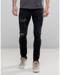 Asos Super Skinny Jeans In Washed Black With Heavy Rips And Hem Detail