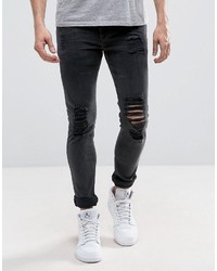Asos Super Skinny Jeans In Washed Black With Heavy Rips