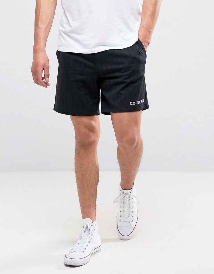 black high top converse with shorts