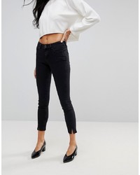 ASOS DESIGN Asos Lisbon Skinny Mid Rise Jeans With Twisted Seams In Washed Black